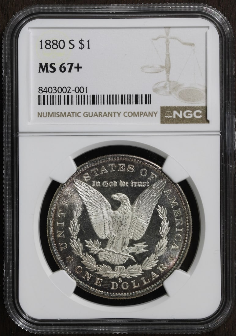 NGC Graded MS67 Plus 1880 San Francisco Morgan Silver Dollar: NGC Graded MS67 Plus 1880 San Francisco Morgan Silver Dollar This is an un-used 1880-S Morgan Silver Dollar with a Mint State 67+ grade, certified by NGC. Struck at the San Francisco Mint, this pre-ow