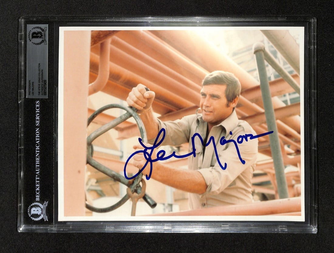 Lee Majors Signed 8x10 Photograph The Six Million Dollar Man BAS: Lee Majors Signed 8x10 Photograph The Six Million Dollar Man BAS This autographed 8x10 color photograph features Lee Majors as Steve Austin from the iconic TV series The Six Million Dollar Man. The ph