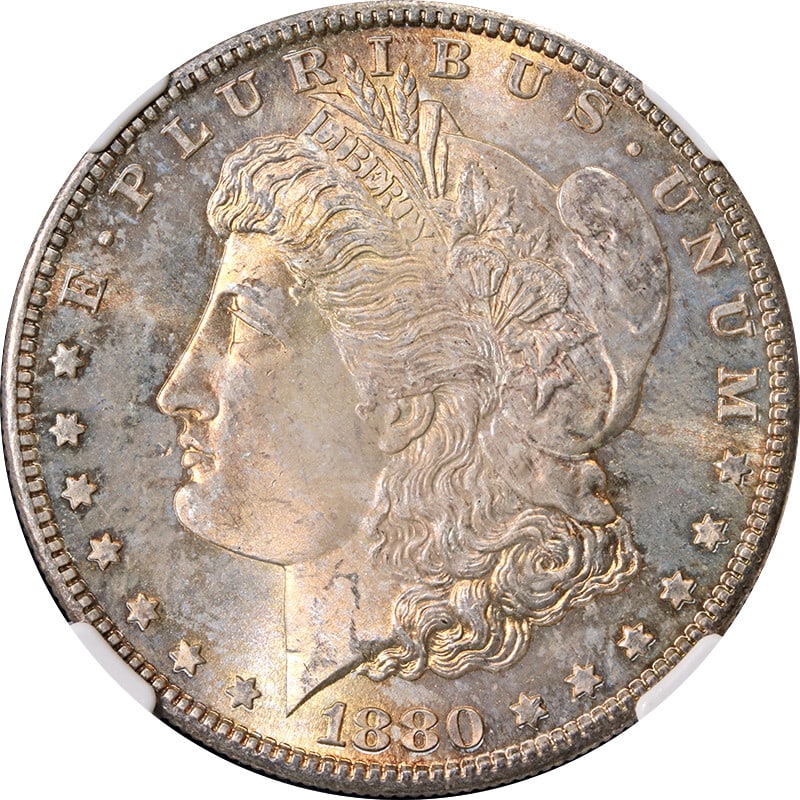 1880-S Morgan Silver Dollar NGC MS66 with Beautiful Toning: 1880-S Morgan Silver Dollar NGC MS66 with Beautiful Toning This 1880-S Morgan Silver Dollar is certified by NGC with a grade of MS66, indicating its uncirculated condition and high quality. The coin f
