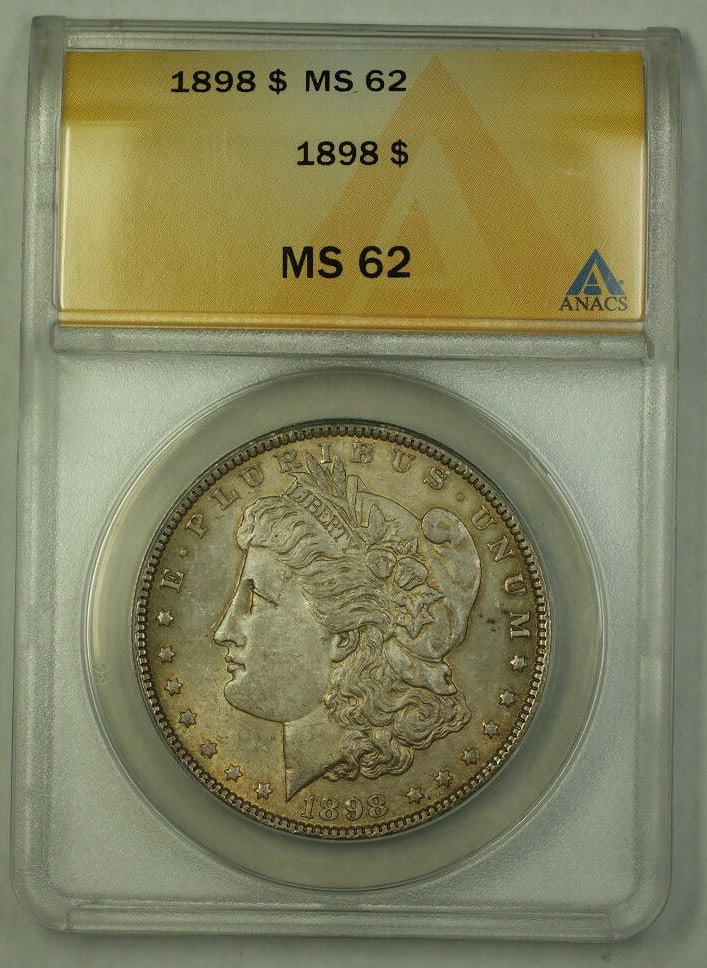 1898 ANACS MS-62 Morgan Dollar Toned Silver Coin Philadelphia Mint: 1898 ANACS MS-62 Morgan Dollar Toned Silver Coin Philadelphia Mint This is an 1898 Morgan Silver Dollar graded MS-62 by ANACS. The coin is uncirculated and features a toned finish. It was minted in Ph