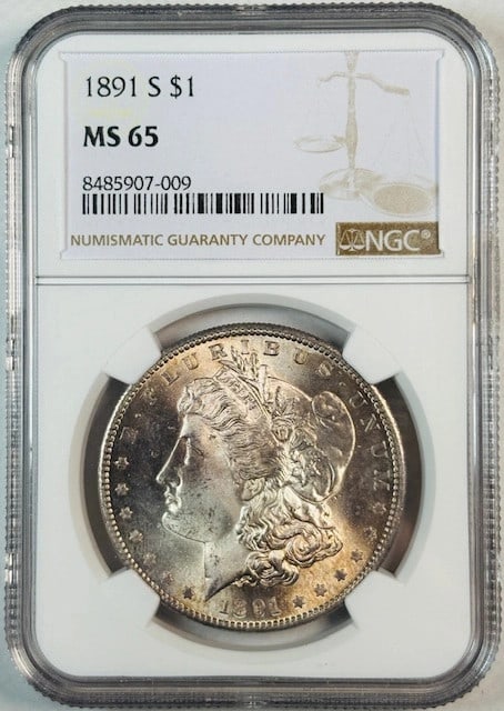 NGC MS 65 Graded 1891 San Francisco Morgan Silver Dollar: NGC MS 65 Graded 1891 San Francisco Morgan Silver Dollar This 1891 S Morgan Silver Dollar is certified by NGC with a grade of MS 65, indicating it is in uncirculated condition. Struck at the San Franc