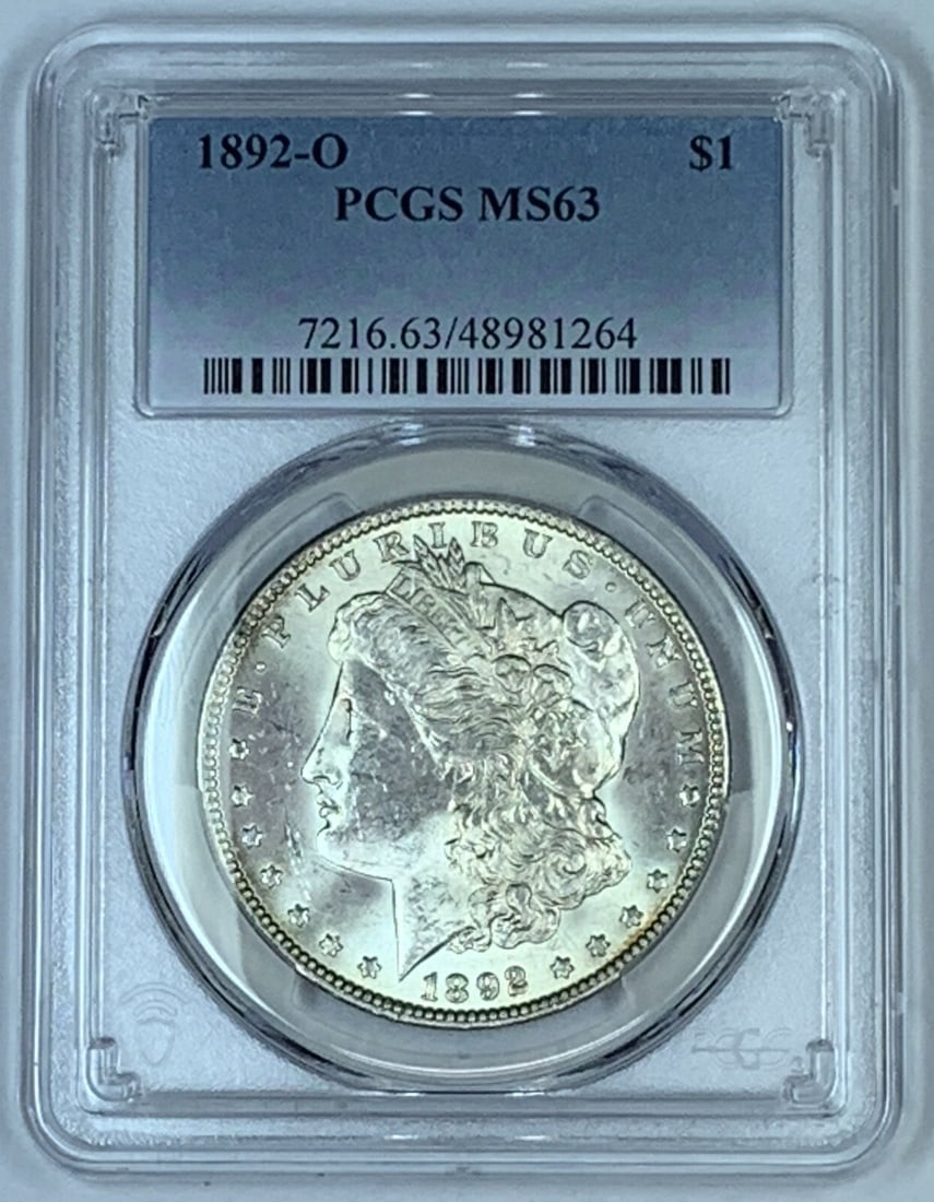 PCGS MS 63 1892-O Morgan Silver Dollar Uncirculated Certified Coin: PCGS MS 63 1892-O Morgan Silver Dollar Uncirculated Certified Coin This is a 1892-O Morgan Silver Dollar coin graded MS 63 by PCGS. The coin is uncirculated and composed of silver, featuring the class