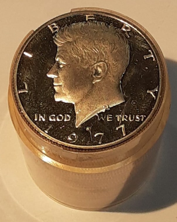 Roll of 20 1977-S Kennedy Half Dollar Proof Coins in Tube: Roll of 20 1977-S Kennedy Half Dollar Proof Coins in Tube This roll contains 20 un-used 1977-S Proof Kennedy Half Dollar coins, each struck at the San Francisco Mint. The coins are composed of copper-