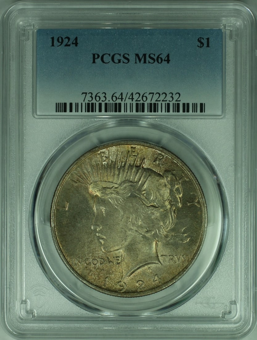PCGS MS-64 1924 Peace Dollar Silver Coin Philadelphia Toned: PCGS MS-64 1924 Peace Dollar Silver Coin Philadelphia Toned This is a 1924 Peace Silver Dollar coin from the United States, minted in Philadelphia. Graded MS-64 by PCGS, this uncirculated coin feature