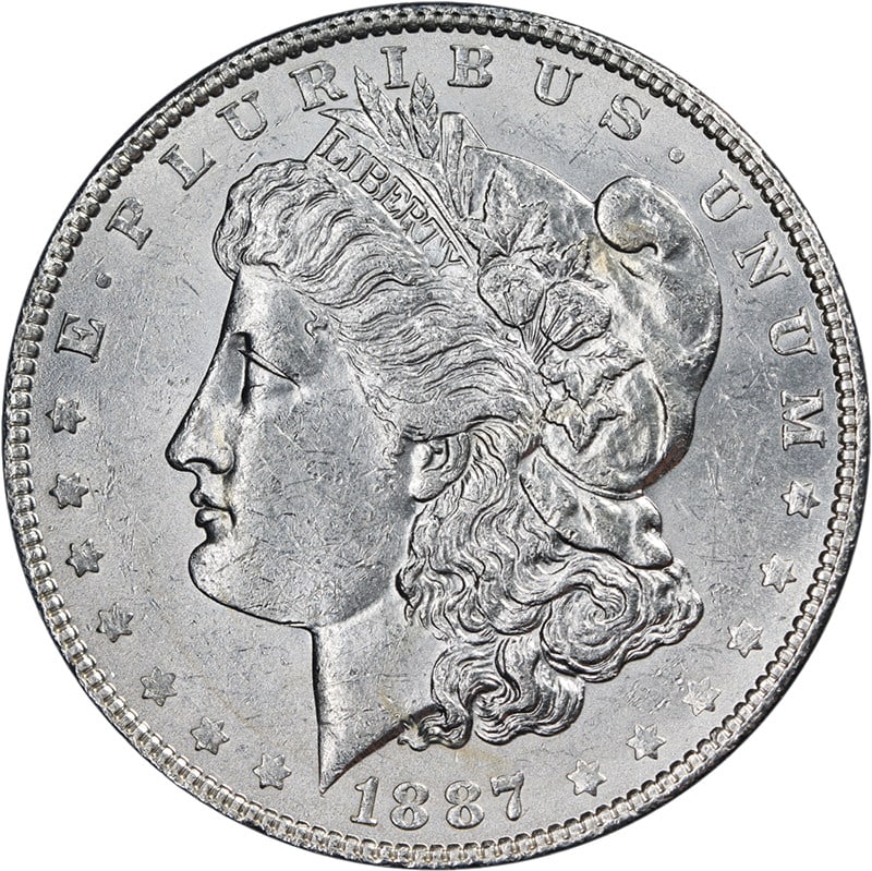 1887 Overdate Morgan Dollar Philadelphia AU to BU Silver Coin: 1887 Overdate Morgan Dollar Philadelphia AU to BU Silver Coin This 1887/6-P Morgan Silver Dollar features a popular overdate variety with bright white luster and attractive eye appeal. The coin displa