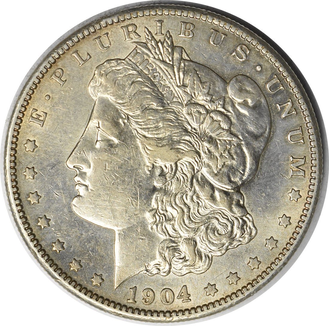 1904-S Morgan Silver Dollar AU Uncertified San Francisco 90% Silver: 1904-S Morgan Silver Dollar AU Uncertified San Francisco 90% Silver This 1904-S Morgan Silver Dollar is a remarkable piece for collectors. It features a stunning design by George T. Morgan and showcas