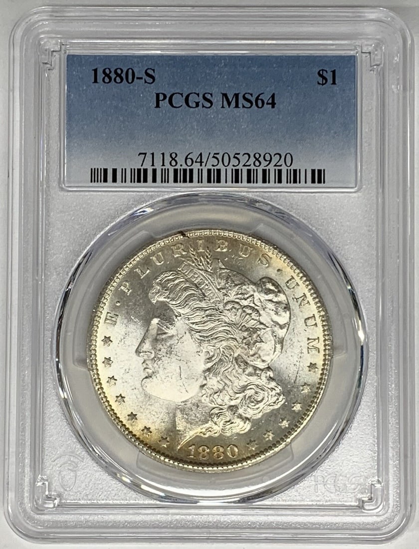 PCGS MS 64 1880-S Morgan Dollar Silver Uncirculated Coin: PCGS MS 64 1880-S Morgan Dollar Silver Uncirculated Coin This is an 1880-S Morgan Silver Dollar graded MS 64 by PCGS. The coin is uncirculated and composed of silver, originating from the United State