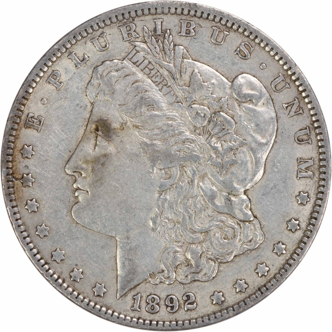 1892 Philadelphia Morgan Dollar Extra Fine Uncertified Silver Coin: 1892 Philadelphia Morgan Dollar Extra Fine Uncertified Silver Coin This 1892 Morgan Silver Dollar from the United States features a composition of 90% silver and 10% copper. Designed by George T. Morg