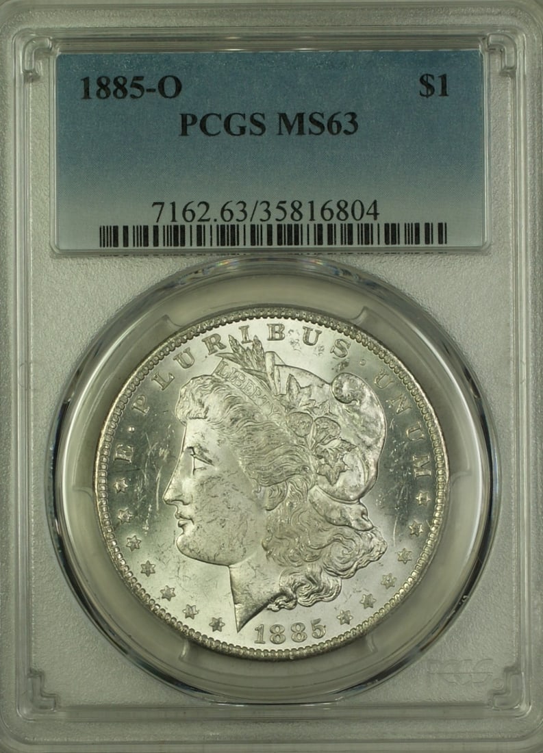 PCGS MS-63 1885-O Morgan Dollar Silver Coin New Orleans Mint: PCGS MS-63 1885-O Morgan Dollar Silver Coin New Orleans Mint This is an 1885-O Morgan Silver Dollar with a denomination of $1, certified by PCGS with a grade of MS 63. Minted in New Orleans, this unci