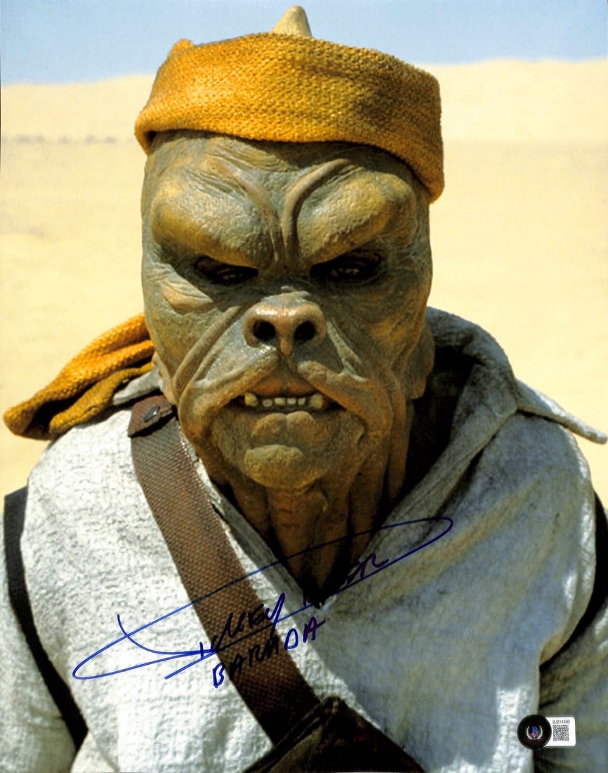 Dickey Beer Signed 11x14 Return of the Jedi Photo Beckett Authenticated: Dickey Beer Signed 11x14 Return of the Jedi Photo Beckett Authenticated This is an original 11x14 photograph signed in blue permanent marker by Dickey Beer, the stuntman for Boba Fett in Star Wars: Re
