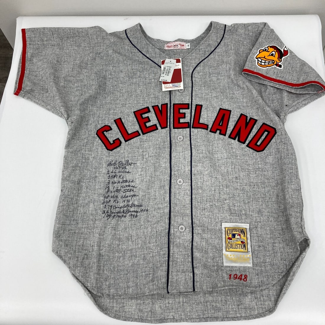 Bob Feller Signed Mitchell & Ness Indians Jersey with 11 Inscriptions PSA: Bob Feller Signed Mitchell & Ness Indians Jersey with 11 Inscriptions PSA Celebrate the legacy of baseball legend Bob Feller with this signed and inscribed 1948 Mitchell & Ness Cleveland Indians jerse