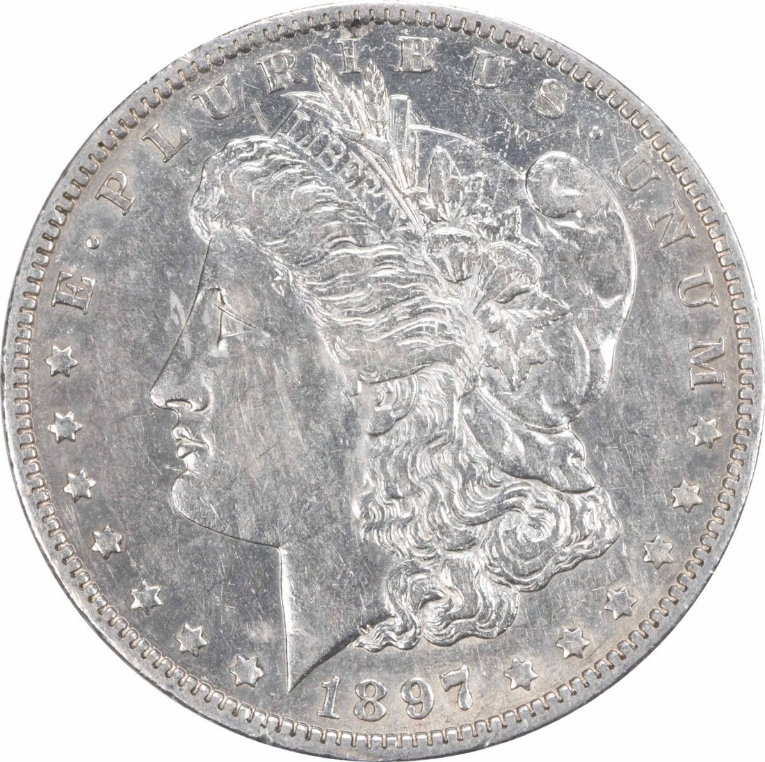 1897-O Morgan Silver Dollar AU Uncertified New Orleans Coin: 1897-O Morgan Silver Dollar AU Uncertified New Orleans Coin This 1897-O Morgan Silver Dollar is a remarkable piece of numismatic history, featuring a stunning design by George T. Morgan. Crafted from