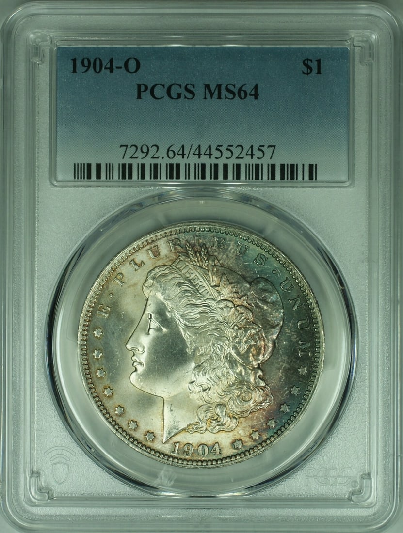 PCGS MS64 1904-O New Orleans Morgan Dollar Silver Toned $1 Coin: PCGS MS64 1904-O New Orleans Morgan Dollar Silver Toned $1 Coin This is a 1904-O Morgan Silver Dollar, minted in New Orleans and certified by PCGS with a grade of MS 64. The coin is composed of silver