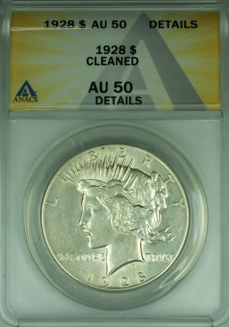 1928 Peace Dollar Silver Coin ANACS AU 50 Details Cleaned: 1928 Peace Dollar Silver Coin ANACS AU 50 Details Cleaned This 1928 Peace Silver Dollar features a certification by ANACS with a grade of AU-50 Details. The coin has undergone cleaning and is composed