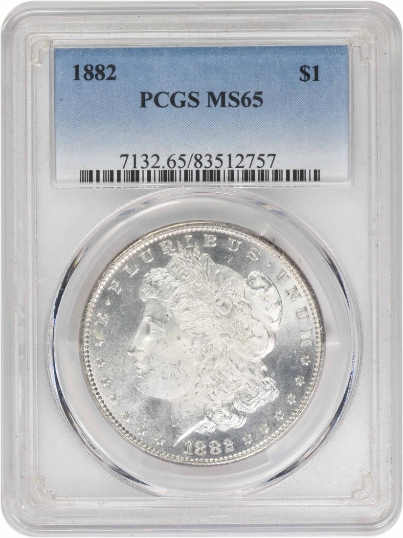 PCGS MS65 Graded 1882 Morgan Dollar Philadelphia Mint Silver Coin: PCGS MS65 Graded 1882 Morgan Dollar Philadelphia Mint Silver Coin This 1882 Morgan Silver Dollar is graded MS65 by PCGS and is composed of 90% silver and 10% copper. Minted in Philadelphia with no min
