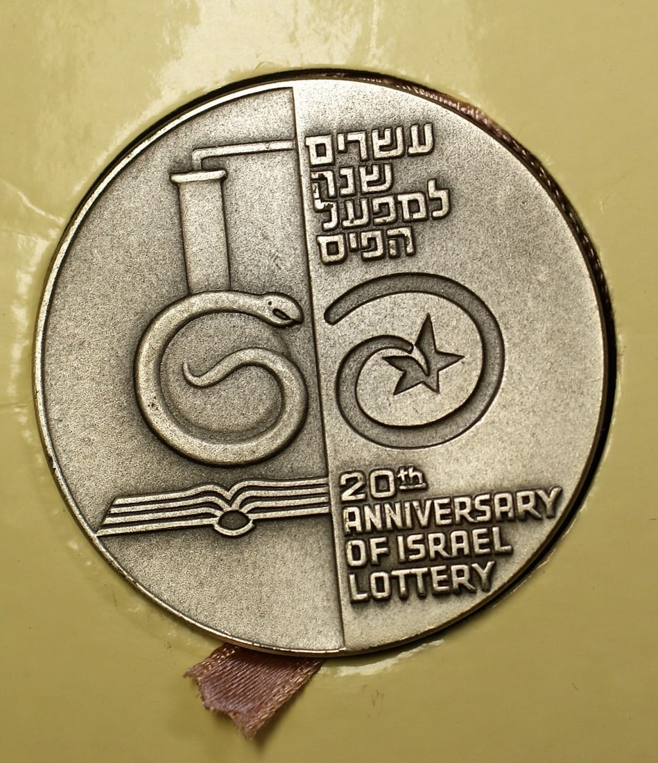 1970 Israel Silver Medal Commemorating Lottery 20th Anniversary Boxed: 1970 Israel Silver Medal Commemorating Lottery 20th Anniversary Boxed This 1970 Israel 20th Anniversary of Lottery State silver medal is an un-used commemorative piece, accompanied by its original car