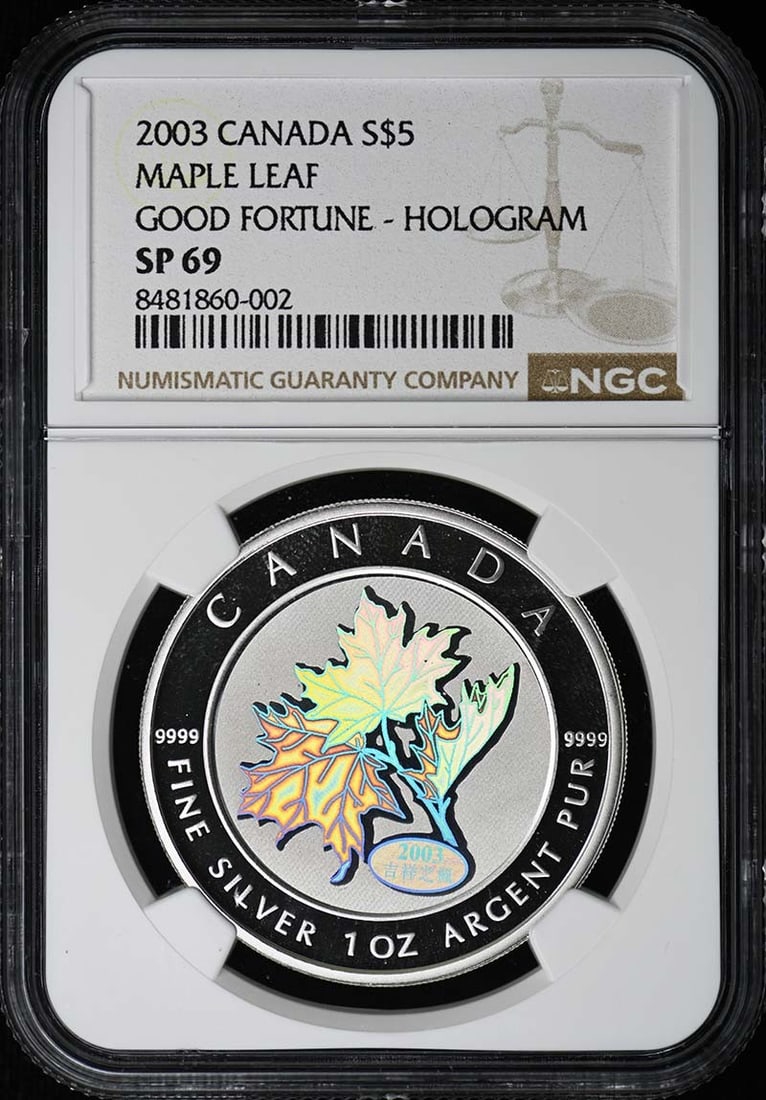 2003 Canadian Maple Leaf $5 Silver Coin NGC SP69: 2003 Canadian Maple Leaf $5 Silver Coin NGC SP69 This 2003 Canada Maple Leaf Good Fortune $5 coin has been graded SP69 by NGC and is in uncirculated condition. It is a pre-owned collectible with offic