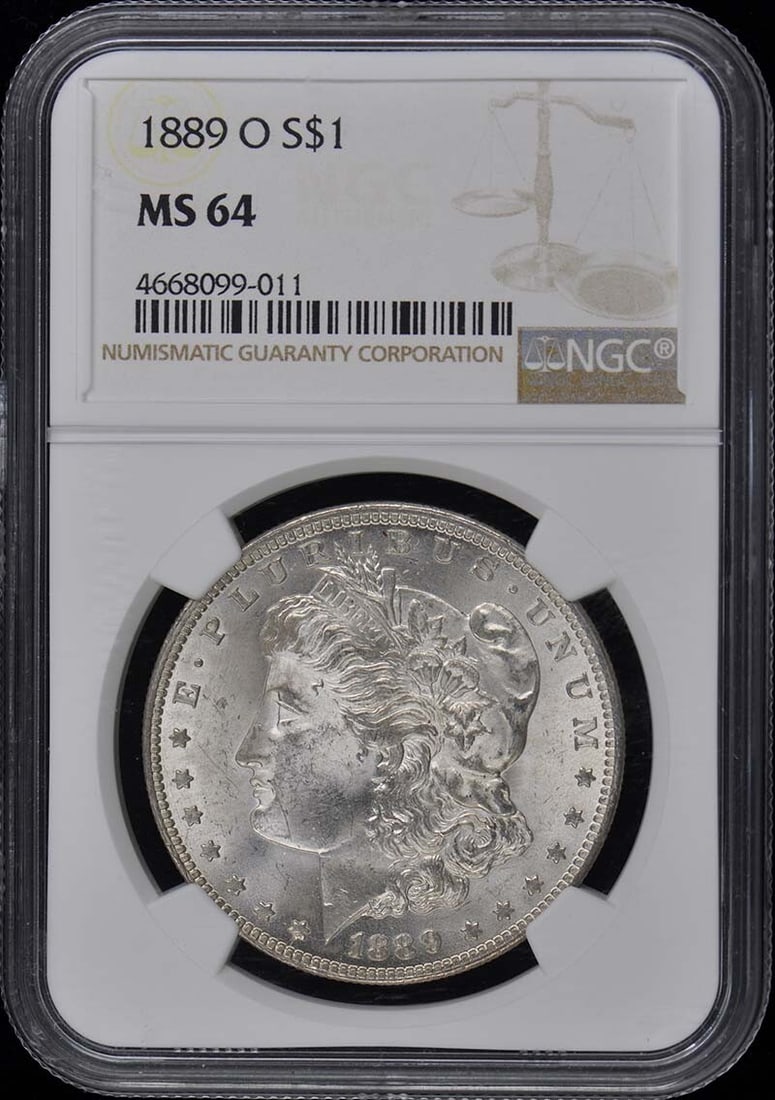 1889-O Morgan Dollar NGC MS64 Uncirculated New Orleans Mint: 1889-O Morgan Dollar NGC MS64 Uncirculated New Orleans Mint This 1889-O Morgan Dollar, graded MS64 by NGC, is a remarkable example of American coinage. Struck in New Orleans, this uncirculated coin sh