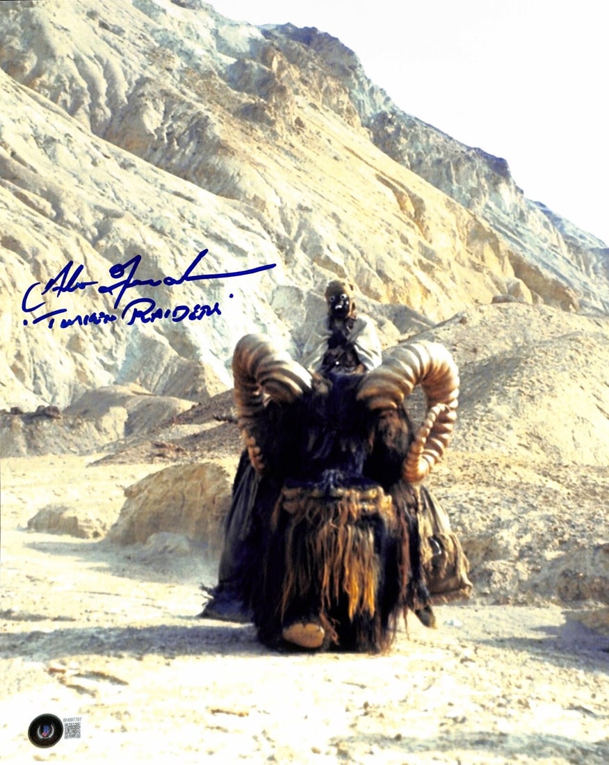 Alan Fernandes Signed 11x14 Star Wars Tusken Raider Photo with Beckett COA: Alan Fernandes Signed 11x14 Star Wars Tusken Raider Photo with Beckett COA This 11x14 color photograph features an autograph and inscription from Alan Fernandes, who portrayed one of the original Tusk