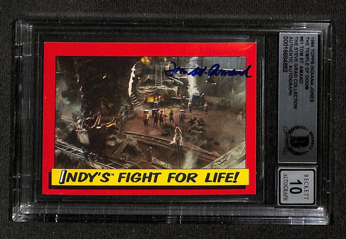 Tom St. Amand Signed 1984 Topps Indiana Jones Card BAS Auto 10: Tom St. Amand Signed 1984 Topps Indiana Jones Card BAS Auto 10 This remarkable trading card features a signed autograph from Tom St. Amand, the ILM Stop Motion animator known for his work on the iconi