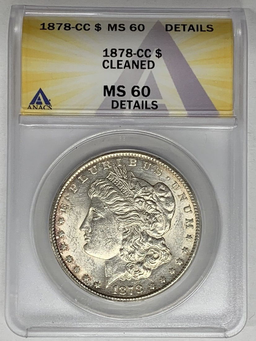ANACS MS 60 1878-CC Carson City Morgan Silver Dollar Cleaned Uncirculated: ANACS MS 60 1878-CC Carson City Morgan Silver Dollar Cleaned Uncirculated This is an 1878-CC Morgan Silver Dollar coin certified by ANACS with a grade of MS 60 Details. The coin has been cleaned and f