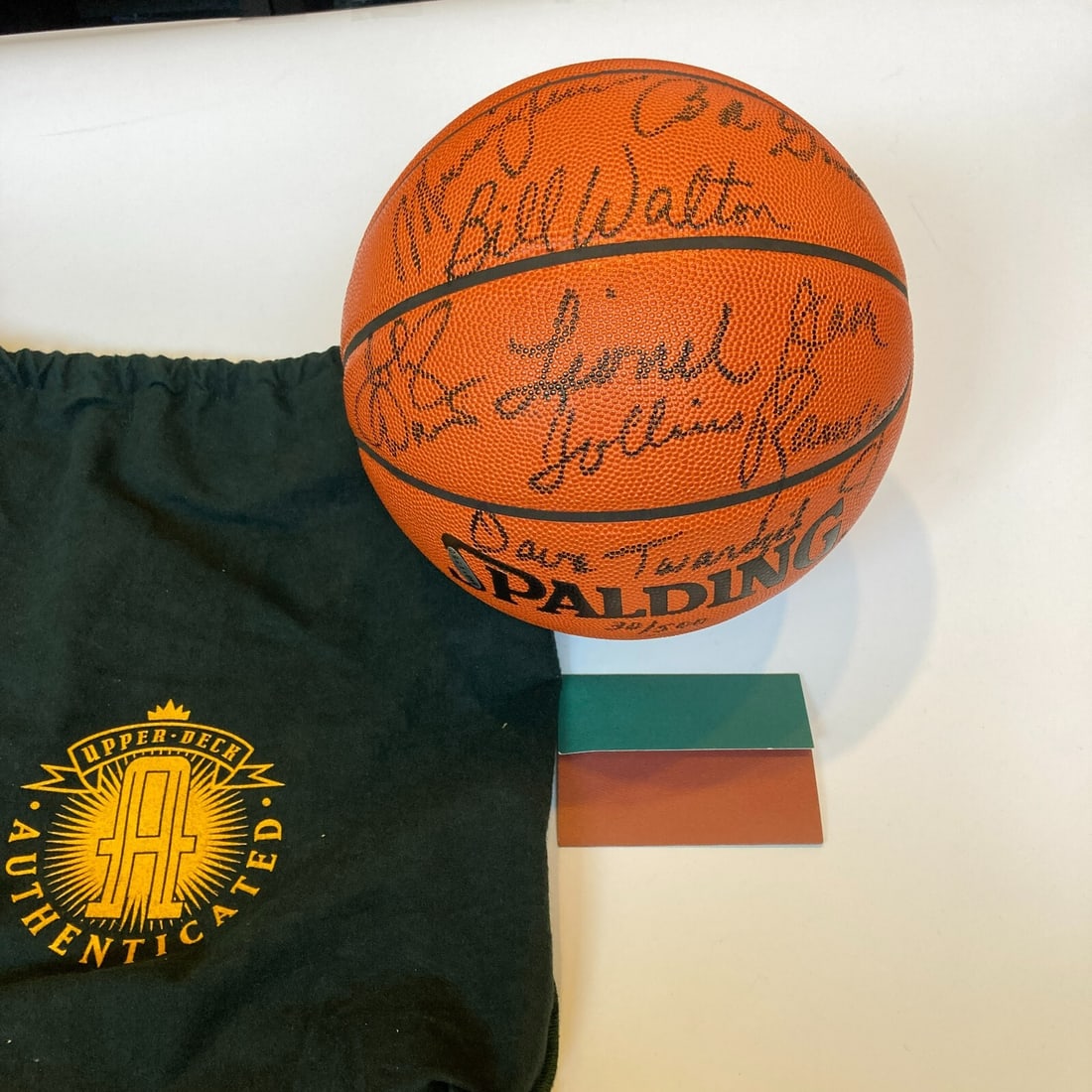 1976-77 Portland Trail Blazers Team Signed Basketball Upper Deck Authenticated: 1976-77 Portland Trail Blazers Team Signed Basketball Upper Deck Authenticated Celebrate the legacy of the 1976-77 Portland Trail Blazers with this original team-signed basketball. This collectible it
