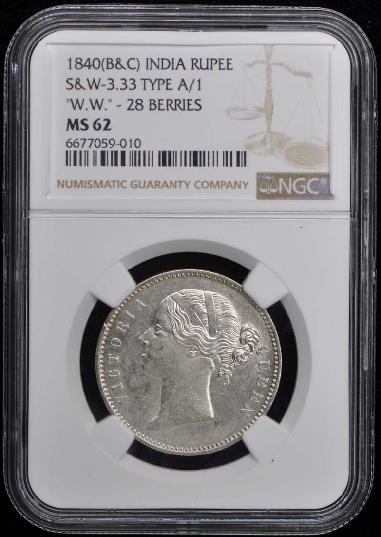 1840 India Rupee MS62 NGC KM458 S&W-3.33 W.W. 28 Berries: 1840 India Rupee MS62 NGC KM458 S&W-3.33 W.W. 28 Berries This 1840 India Rupee, graded MS63 by NGC, is a remarkable piece for collectors. The coin showcases exceptional quality, indicating it has rema