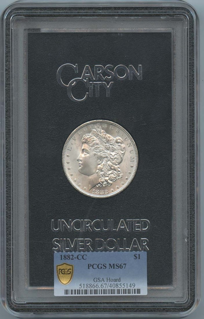 PCGS MS67 1882 Carson City Morgan Silver Dollar GSA Holder: PCGS MS67 1882 Carson City Morgan Silver Dollar GSA Holder This 1882-CC Morgan Dollar is an uncirculated coin graded MS67 by PCGS. Minted at the Carson City Mint, it is housed in a GSA holder and feat