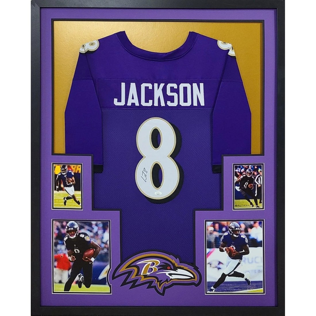 Framed Baltimore Ravens Purple Jersey Signed by Lamar Jackson with JSA Authentication: Framed Baltimore Ravens Purple Jersey Signed by Lamar Jackson with JSA Authentication This framed purple Baltimore Ravens jersey is autographed by Lamar Jackson and authenticated by JSA, featuring a t