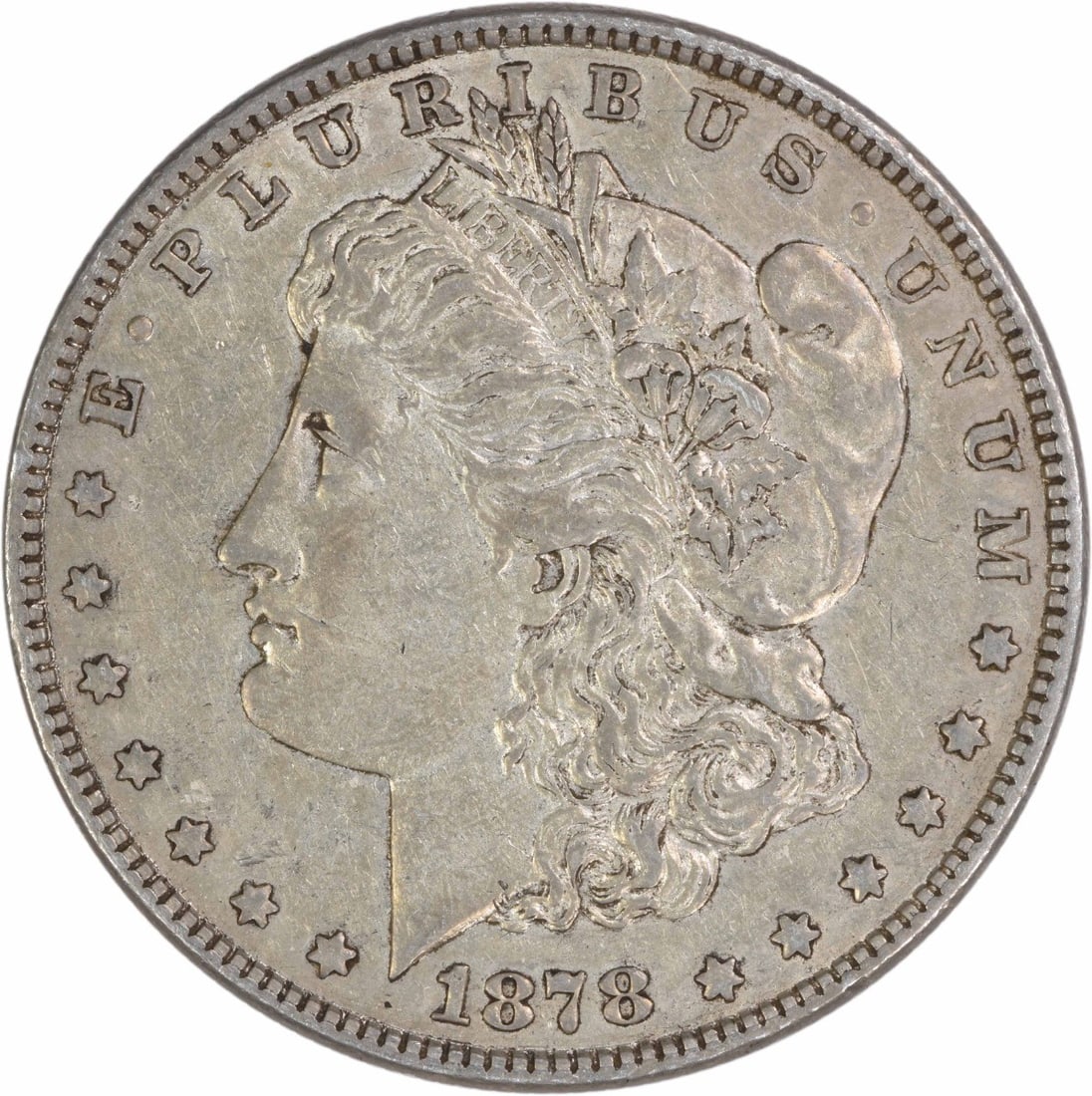 1878 Philadelphia Morgan Dollar 7 Over 8 Tail Feathers EF Uncertified: 1878 Philadelphia Morgan Dollar 7 Over 8 Tail Feathers EF Uncertified This is an 1878 Morgan Silver Dollar featuring the 7/8 Tail Feathers variety. The coin was struck at the Philadelphia mint and is