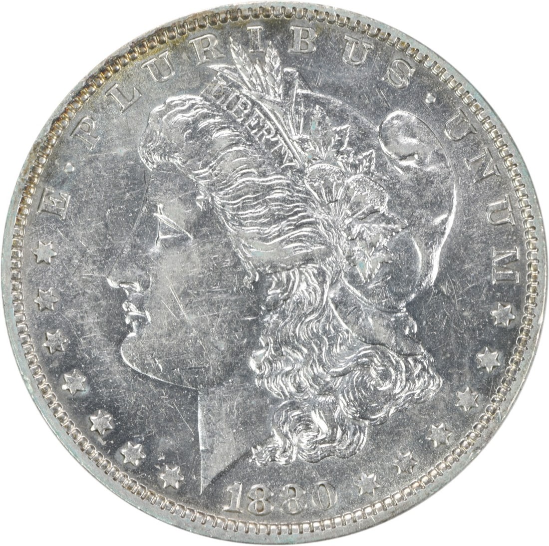1880-O Morgan Silver Dollar AU Uncertified 90% Silver Coin: 1880-O Morgan Silver Dollar AU Uncertified 90% Silver Coin This 1880-O Morgan Silver Dollar showcases a stunning design by George T. Morgan, embodying both historical significance and aesthetic beauty