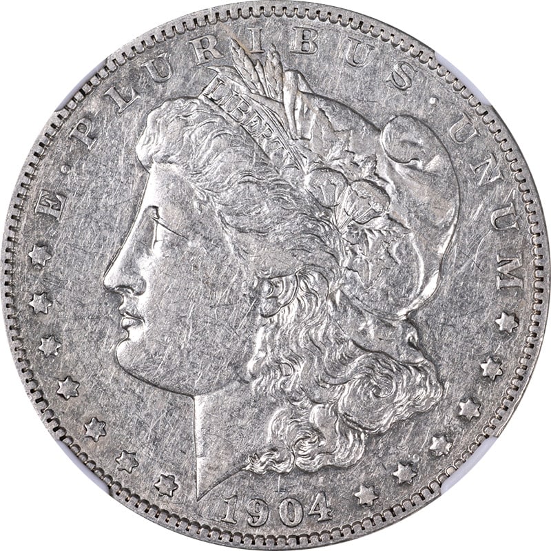 1904-S Morgan Silver Dollar NGC XF40 Circulated Silver Coin: 1904-S Morgan Silver Dollar NGC XF40 Circulated Silver Coin This 1904-S Morgan Silver Dollar, certified by NGC with a grade of XF40, showcases impressive eye appeal and a remarkable strike. The coin f