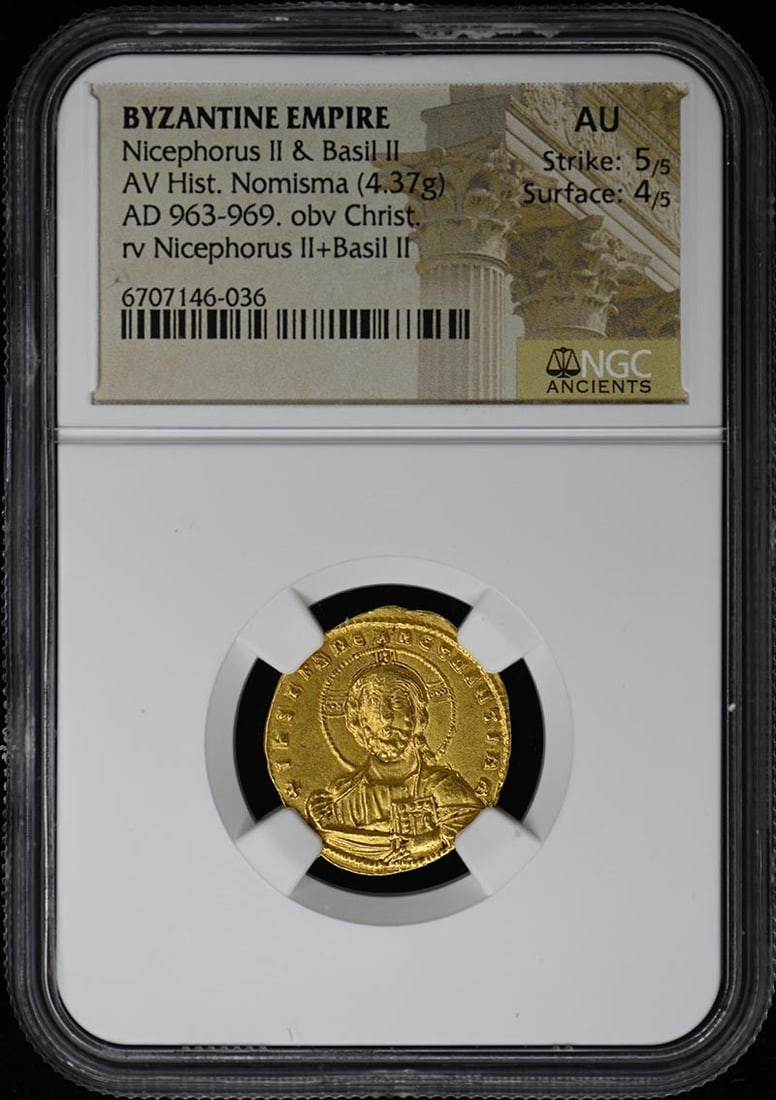 Byzantine Hist Nomisma Coin 4.37g Nicephorus II 963-969 NGC AU Christ: Byzantine Hist Nomisma Coin 4.37g Nicephorus II 963-969 NGC AU Christ This is a pre-owned Byzantine Histamenon Nomisma coin from the reign of Nicephorus II and Basil II, dated 963-969 AD. The coin has