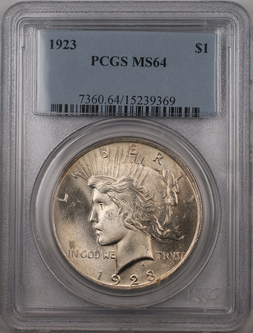PCGS MS64 1923 Peace Silver Dollar with Obverse Die Chip: PCGS MS64 1923 Peace Silver Dollar with Obverse Die Chip This 1923 Silver Peace Dollar is certified by PCGS with a grade of MS-64. Minted in Philadelphia, this uncirculated $1 coin features a die chip