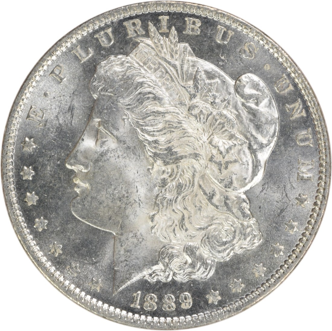 1889 Morgan Silver Dollar Choice BU Uncertified Silver Coin: 1889 Morgan Silver Dollar Choice BU Uncertified Silver Coin This 1889 Morgan Silver Dollar is a stunning piece, showcasing its uncirculated condition with a grade of Choice BU. Struck in silver, this