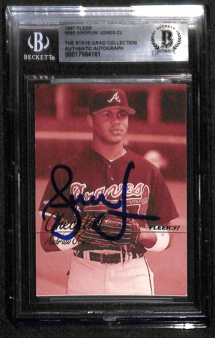 Andruw Jones Signed 1997 Fleer #493 Baseball Card Beckett Authenticated: Andruw Jones Signed 1997 Fleer #493 Baseball Card Beckett Authenticated This is an autographed 1997 Fleer #493 sports trading card featuring Andruw Jones, the talented outfielder of the Atlanta Braves
