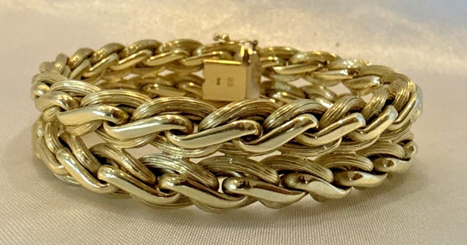 1950s Italian 14K Yellow Gold Chain Bracelet with Woven Link Design: 1950s Italian 14K Yellow Gold Chain Bracelet with Woven Link Design This 1950s Italian bracelet is crafted from 14k yellow gold in a hollow form design. Featuring interlocking woven links, it showcase