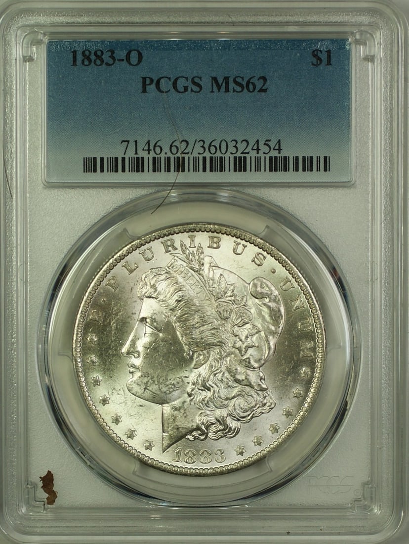 PCGS MS62 1883-O Morgan Dollar Silver Coin from New Orleans Mint: PCGS MS62 1883-O Morgan Dollar Silver Coin from New Orleans Mint This 1883-O Morgan Silver Dollar features a $1 denomination and was minted in New Orleans. Graded MS 62 by PCGS, the coin is composed o