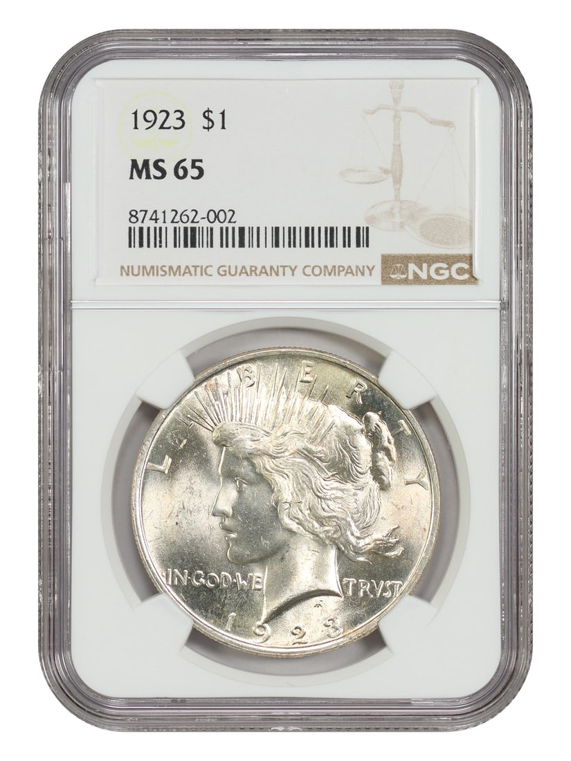 1923 Peace Silver Dollar Graded MS65 by NGC: 1923 Peace Silver Dollar Graded MS65 by NGC This is a 1923 Peace Dollar graded MS65 by NGC. The coin is uncirculated and was minted in Philadelphia. It is part of the Peace Dollar series and is in pre