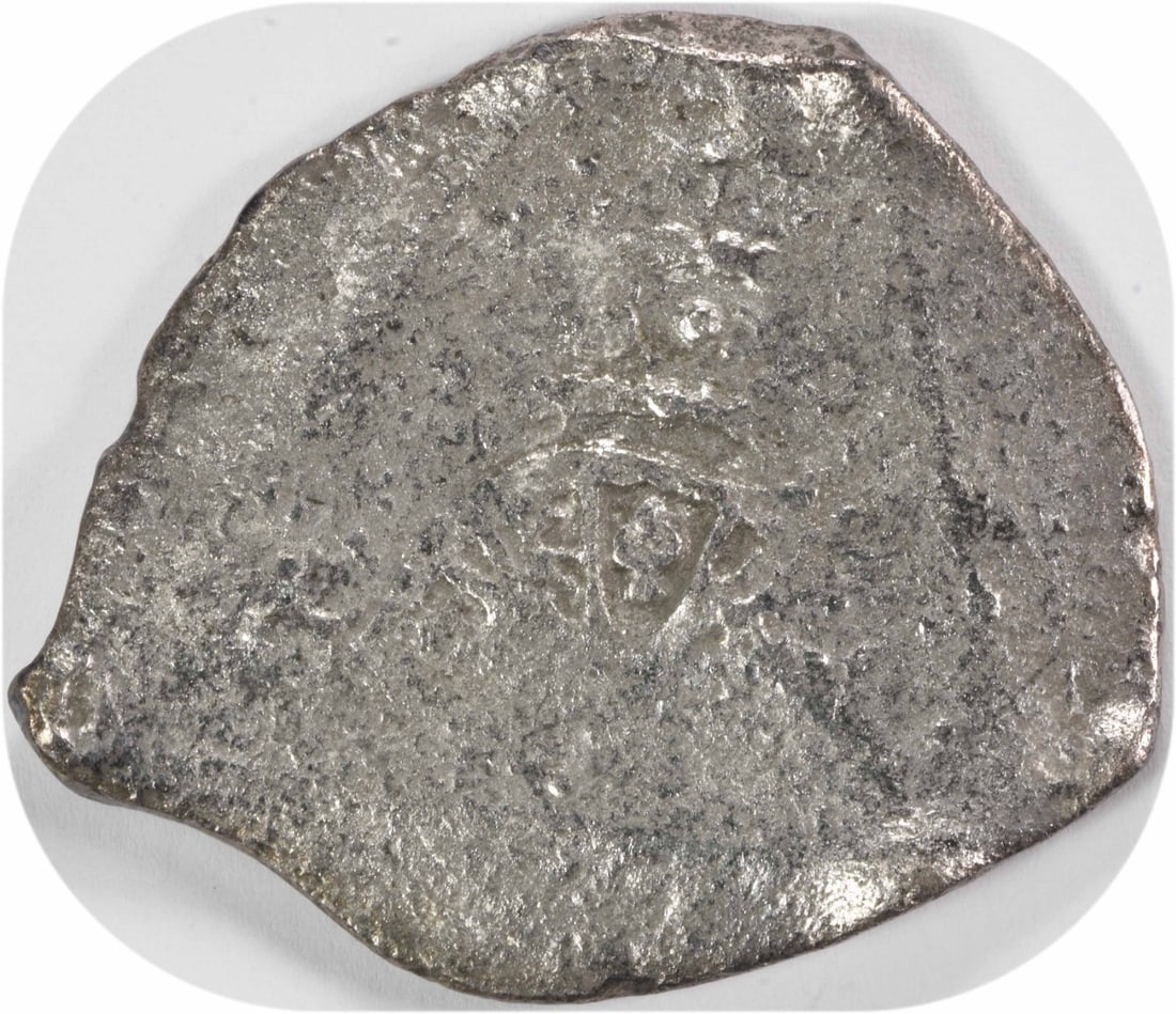 8 Reales Silver Coin From 1715 Fleet Shipwreck With COA Number 608: 8 Reales Silver Coin From 1715 Fleet Shipwreck With COA Number 608 This is a silver 8 Reales cob coin recovered from the 1715 Fleet shipwreck, originating from Mexico. The coin is circulated and pre-o