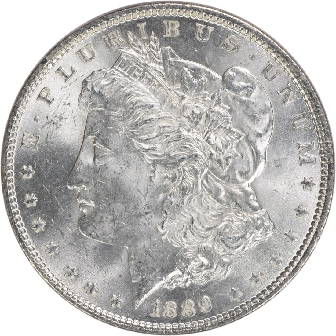 1889 Morgan Silver Dollar Choice BU Uncertified Silver Coin: 1889 Morgan Silver Dollar Choice BU Uncertified Silver Coin This 1889 Morgan Silver Dollar is a stunning piece, graded as Choice BU (Brilliant Uncirculated) and in uncirculated condition. The coin is