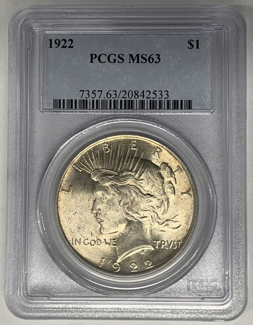 PCGS MS 63 1922 Peace Silver Dollar Certified Uncirculated US Coin: PCGS MS 63 1922 Peace Silver Dollar Certified Uncirculated US Coin This is a 1922 Peace Silver Dollar coin from the United States, featuring a PCGS MS 63 grade. The coin is composed of silver, is unci