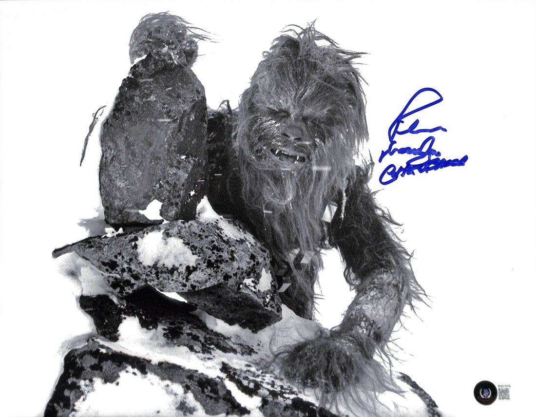 Peter Mayhew Signed Chewbacca 11x14 Photo Beckett Certified: Peter Mayhew Signed Chewbacca 11x14 Photo Beckett Certified This striking 11x14 photograph features the iconic Chewbacca from Star Wars: The Empire Strikes Back, expertly signed by Peter Mayhew, the a