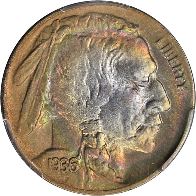 PCGS MS64 1936-D Buffalo Nickel With Vibrant Rainbow Toning: PCGS MS64 1936-D Buffalo Nickel With Vibrant Rainbow Toning This original 1936-D Buffalo Nickel features vibrant rainbow toning, especially prominent on the obverse, with superb luster and strong stri