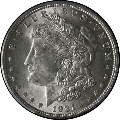 1921-P Morgan Silver Dollar PCGS MS63 Bright White Coin: 1921-P Morgan Silver Dollar PCGS MS63 Bright White Coin This 1921-P Morgan Silver Dollar is certified by PCGS with a grade of MS63, showcasing its bright white appearance and excellent luster. The coi