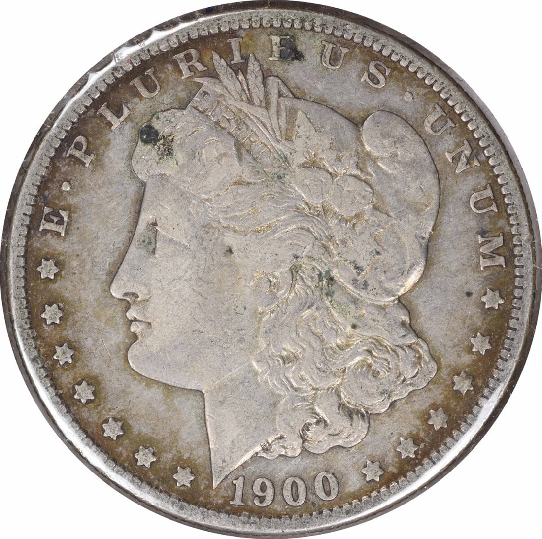 1900-O Morgan Silver Dollar VF Uncertified 90% Silver Coin: 1900-O Morgan Silver Dollar VF Uncertified 90% Silver Coin This 1900-O/CC Morgan Silver Dollar is a classic piece of American numismatics, featuring a design by George T. Morgan. This coin, with a gra