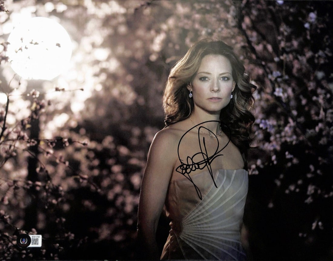 Jodie Foster Autographed 11x14 Photo Beckett Certified: Jodie Foster Autographed 11x14 Photo Beckett Certified This autographed 11x14 photograph features the signature of acclaimed actress Jodie Foster, penned in black permanent marker. The photograph is o
