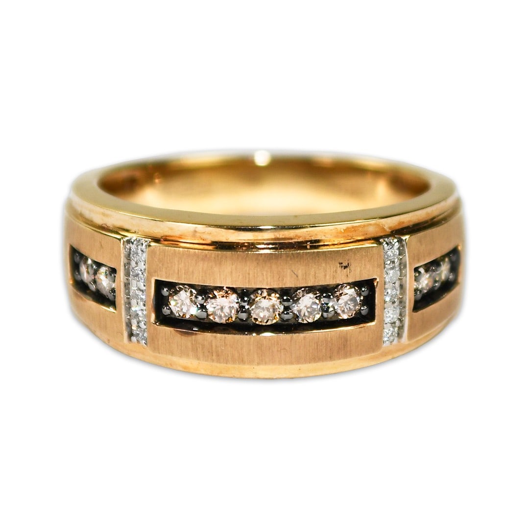 Men's 10k Yellow Gold Band Ring with 0.30ct Diamonds Size 8.5: Men's 10k Yellow Gold Band Ring with 0.30ct Diamonds Size 8.5 This men's ring features a band crafted from 10k yellow gold, set with round brilliant cut diamonds. The center showcases cognac-colored d