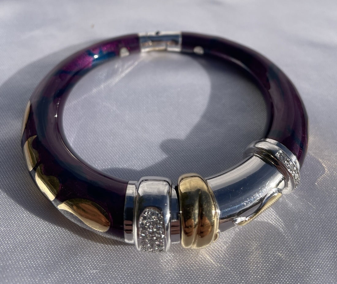 Italian Soho 18K Gold Diamond Bracelet with Enameled Design: Italian Soho 18K Gold Diamond Bracelet with Enameled Design Discover the elegance of this Italian Soho 18K White and Yellow Enameled Gold and Diamond Bracelet. Crafted with exquisite detail and workma