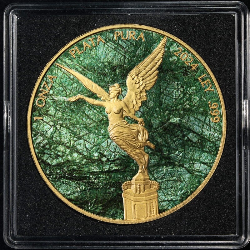 2024 Silver Libertad Guatemala Green Marble Edition 1 Oz Coin in OGP: 2024 Silver Libertad Guatemala Green Marble Edition 1 Oz Coin in OGP This 2024 Mexico 1 Ounce Silver Libertad features the special Guatemala Green Marble Edition. The coin is composed of 0.999 fine si